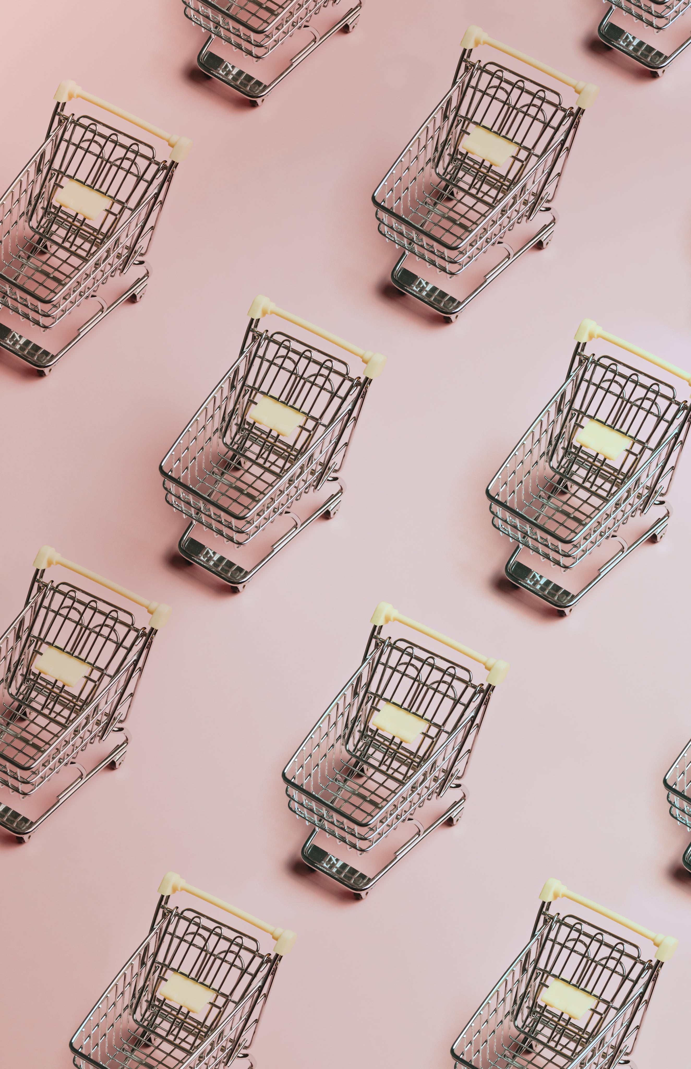 pattern-of-silver-shopping-carts-on-a-pink-background.jpg